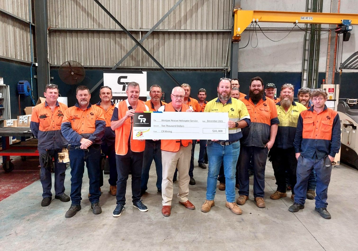 Tomago fabrication centre presenting a check to Westpac Helicopter Rescue.